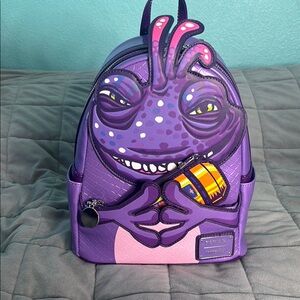 Loungefly Monsters In. Randall Boggs Pixar limited edition backpack.